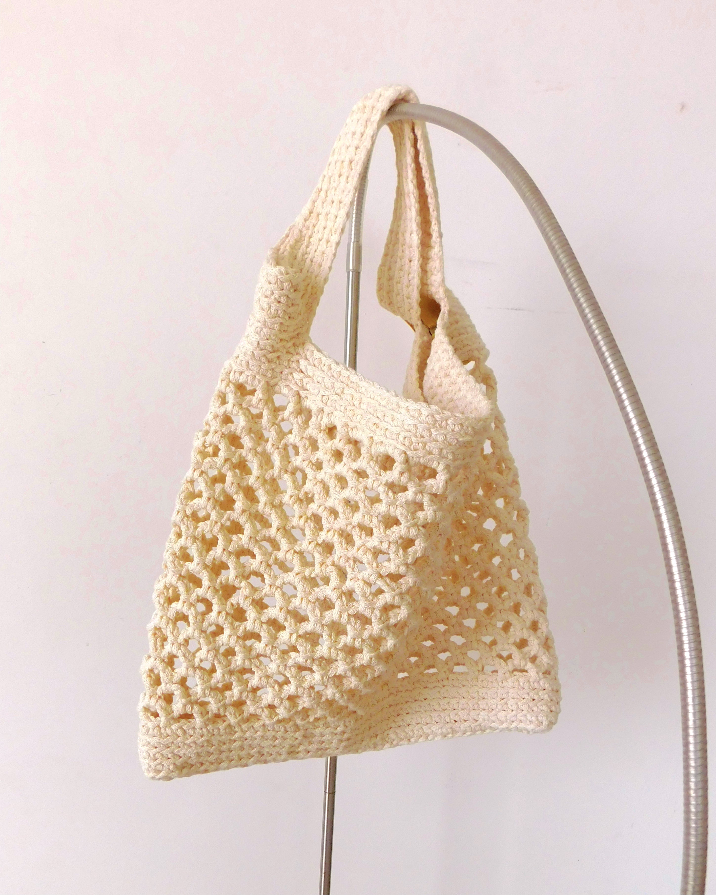 Borsa da spiaggia bianca a rete all'uncinetto in cotone di que lo que