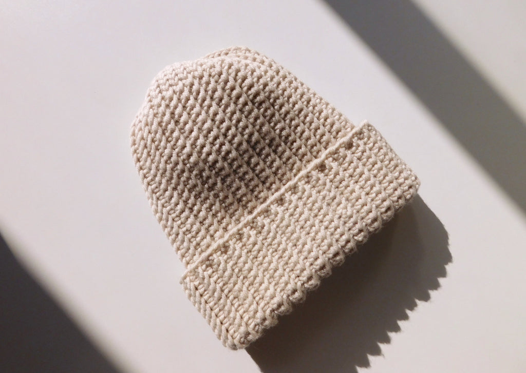 Caldo cappello fatto a mano all'uncinetto in lana merino